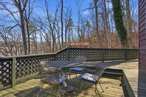 a view of balcony with wooden floor