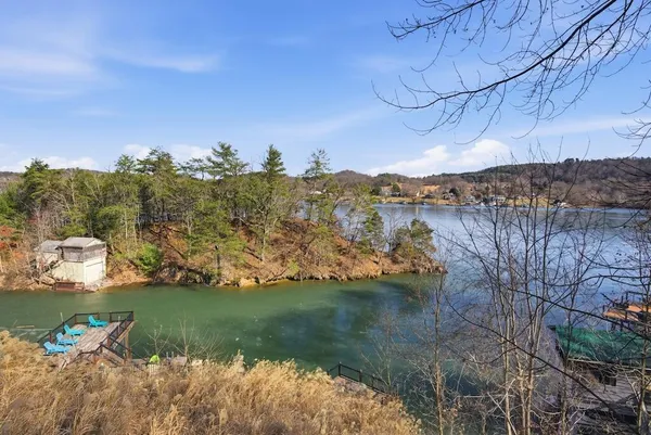 a view of lake with green space
