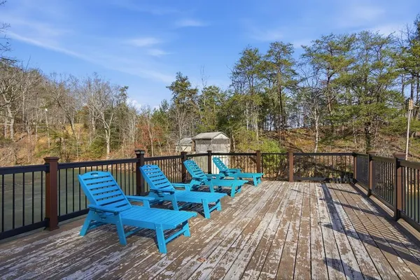 a view of a chairs on the roof deck
