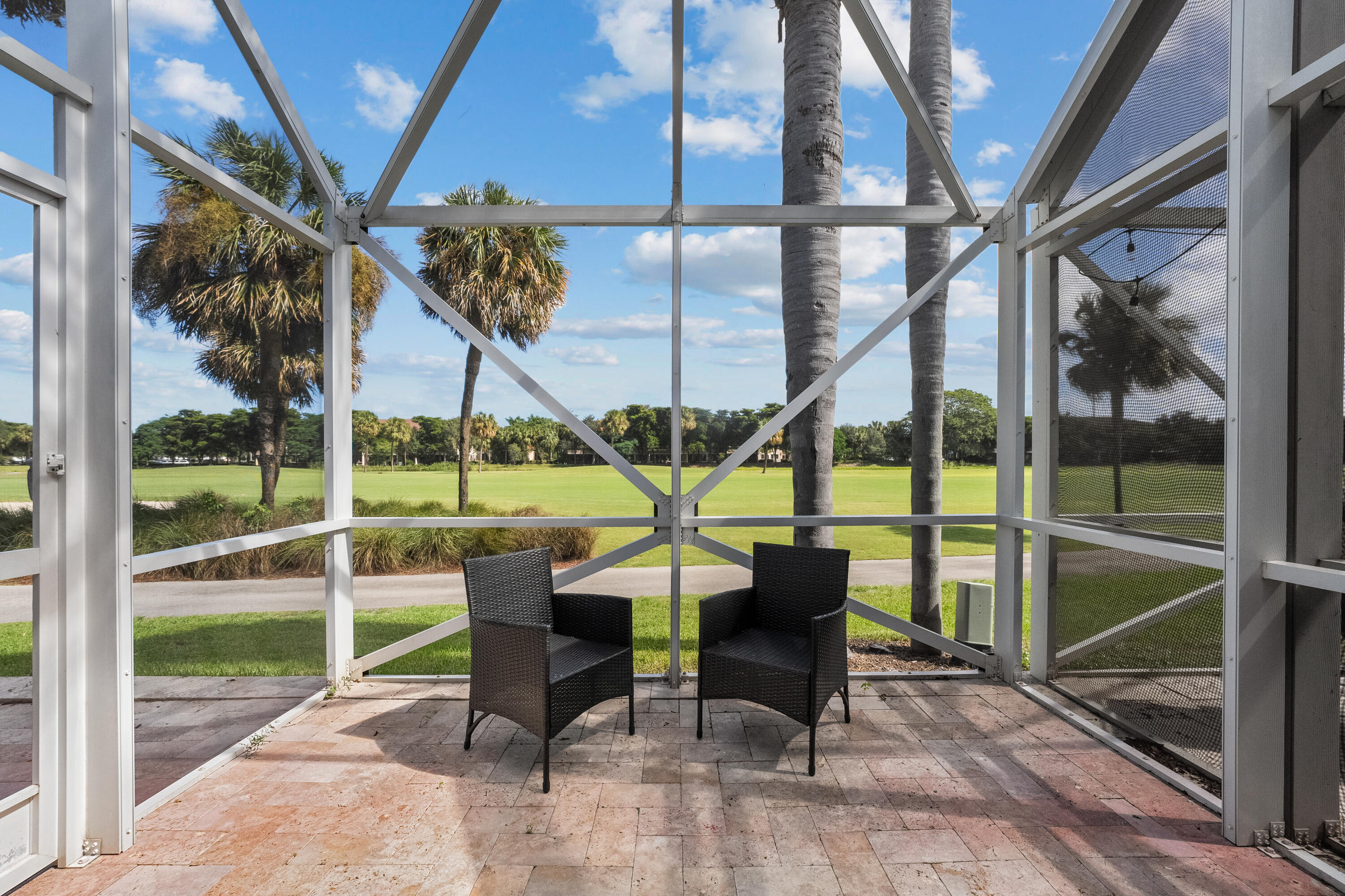 17082 Boca Club Boulevard, Unit 3 Boca Raton, FL 33487 - Photo 32 of 43 Screened-in Lanai