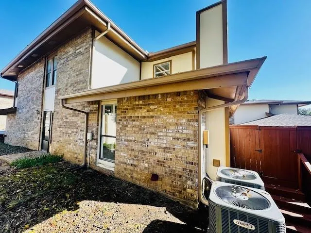 a front view of a house with a garage