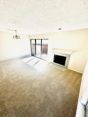 a bedroom with a bed and cabinets