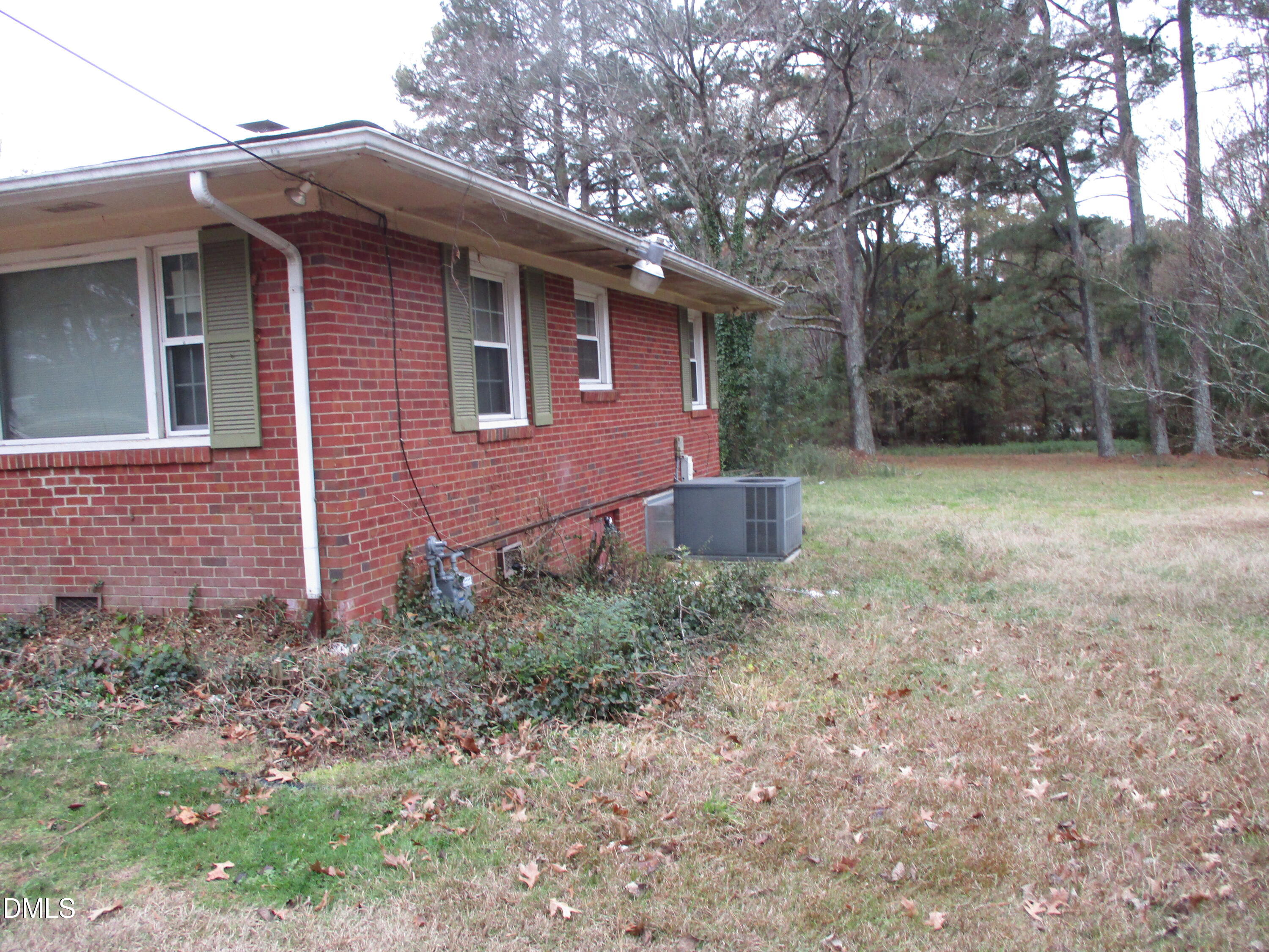 2526 Poole Road Raleigh, NC 27610 - Photo 4 of 5 a front view of a house with a yard