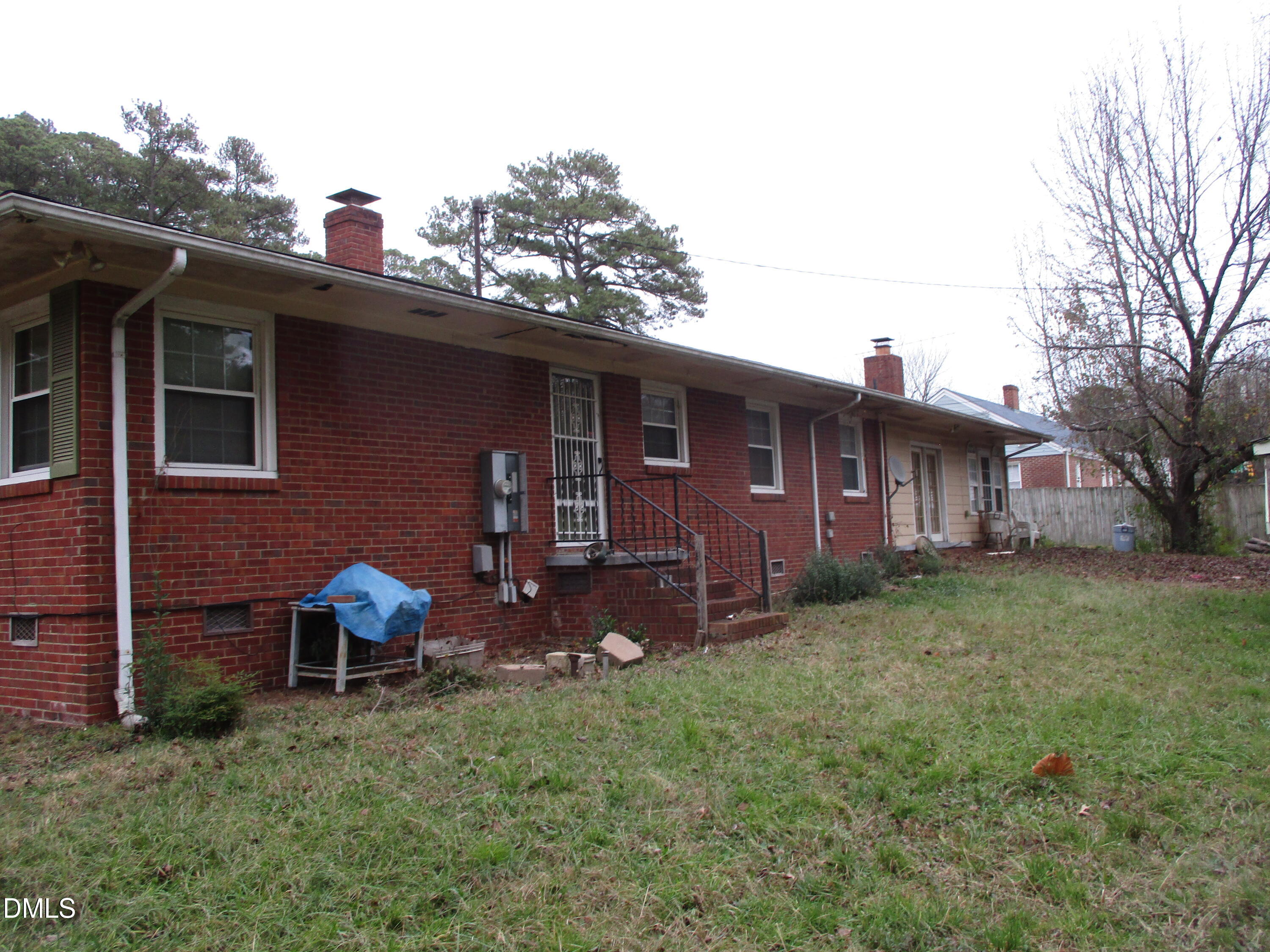 2526 Poole Road Raleigh, NC 27610 - Photo 5 of 5 a view of a house with a yard