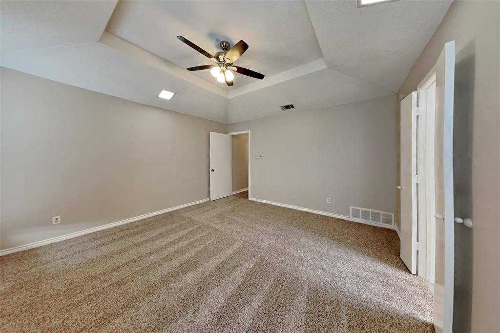 1906 Lavaca Trail Carrollton, TX 75010 - Photo 16 of 31 a view of an empty room with a window