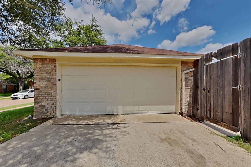 1906 Lavaca Trail Carrollton, TX 75010 - Photo 28 of 31 a view of backyard with pathway