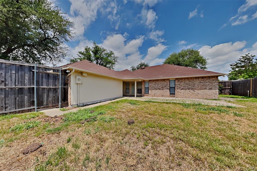1906 Lavaca Trail Carrollton, TX 75010 - Photo 30 of 31 front view of a house with a yard