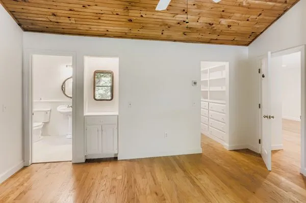 a view of a livingroom with wooden floor
