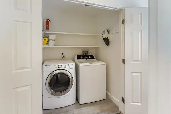 a utility room with dryer and washer