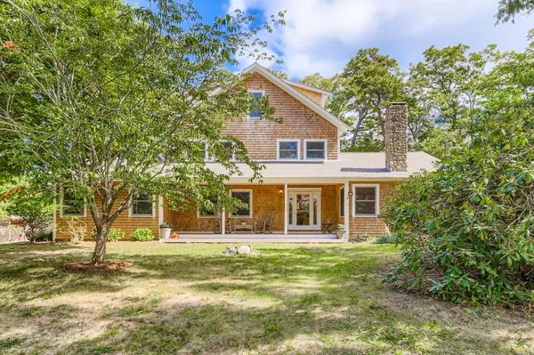 a front view of house with yard