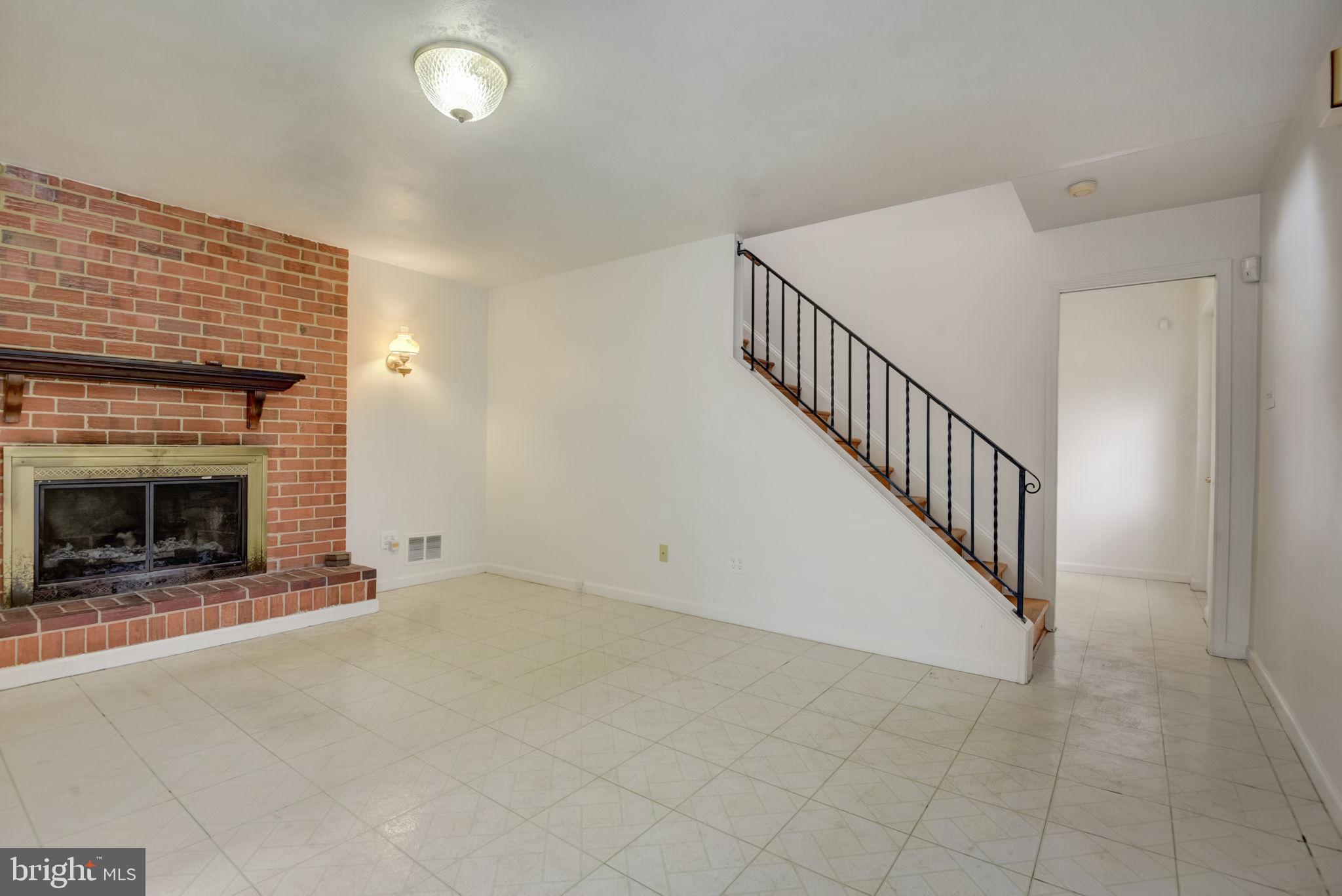 2934 Craiglawn Road Silver Spring, MD 20904 - Photo 32 of 39 32 - Family Room with Fireplace - Lower Level