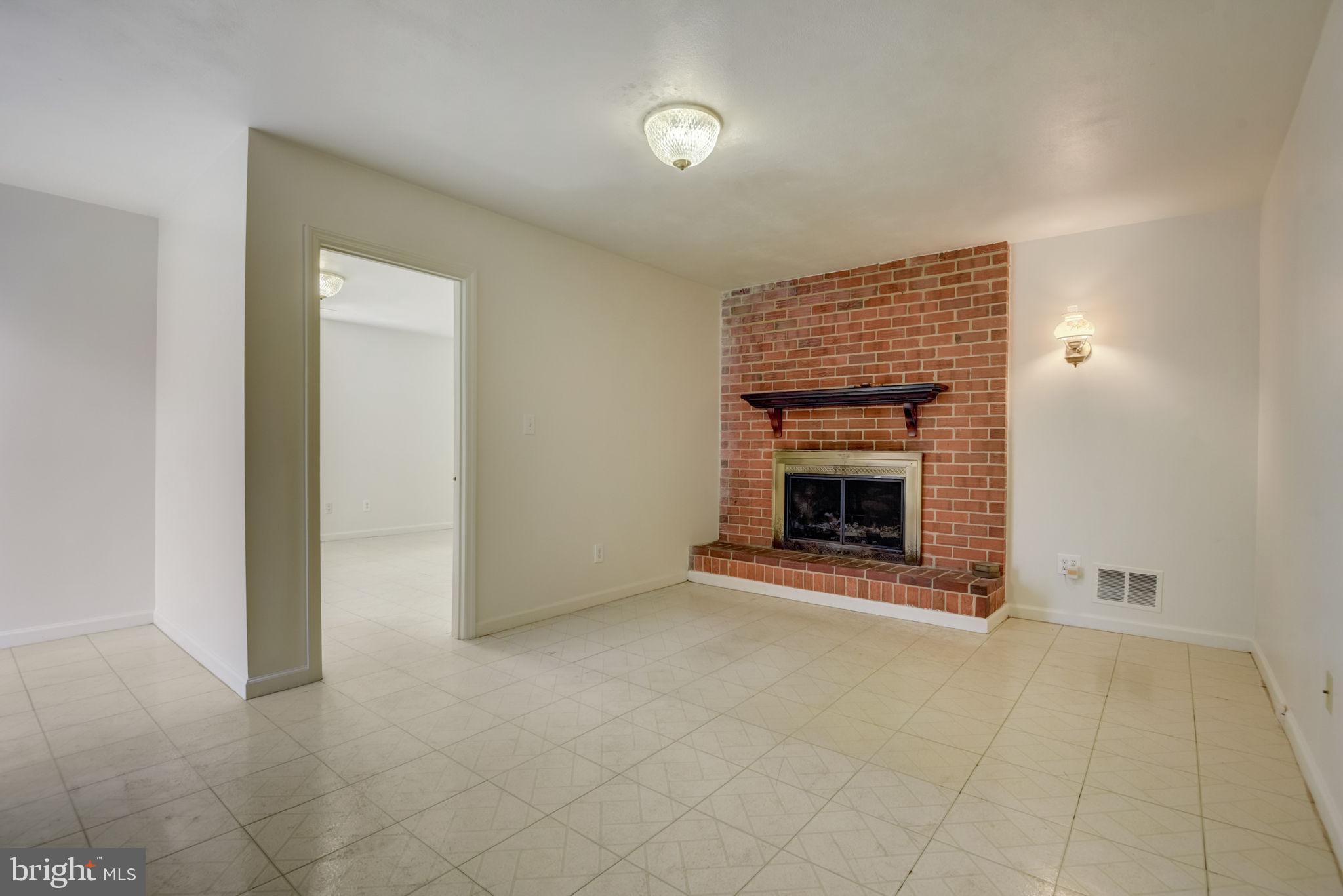 2934 Craiglawn Road Silver Spring, MD 20904 - Photo 33 of 39 33 - Family Room in Lower Level with Fireplace2