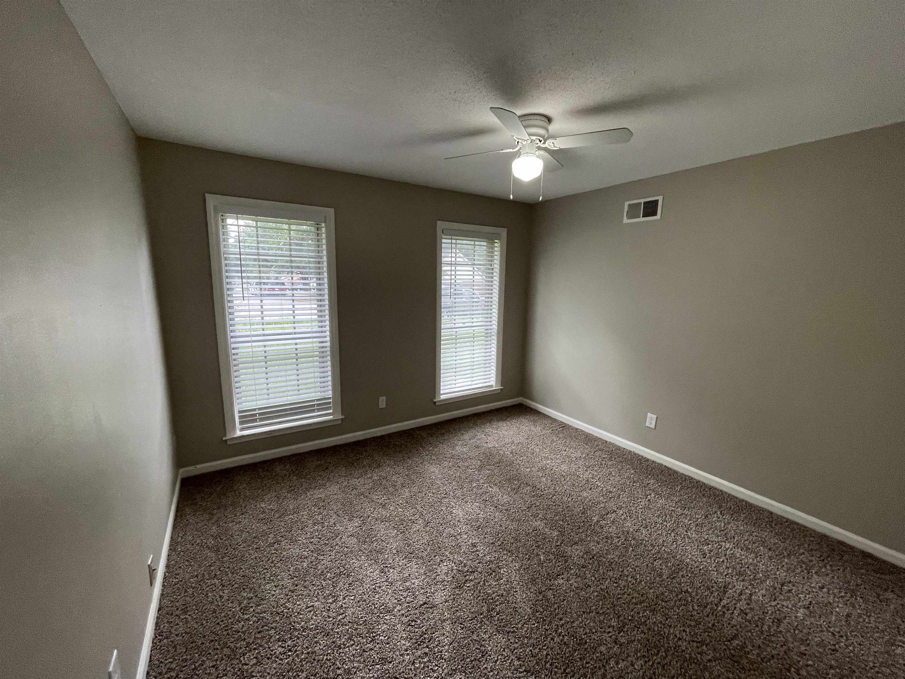 5414 Maple Ridge Road Memphis, TN 38134 - Photo 21 of 23 Unfurnished room with carpet flooring and ceiling fan