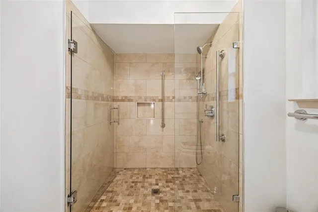 a living room with furniture a rug and a window