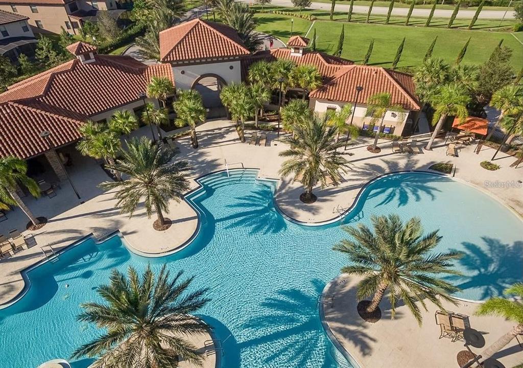 7180 Oakmoss Loop Davenport, FL 33837 - Photo 18 of 29 a view of a chairs and table in patio