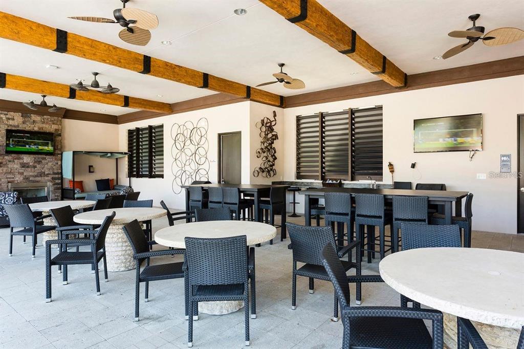 7180 Oakmoss Loop Davenport, FL 33837 - Photo 27 of 29 a view of a dining room with furniture and window