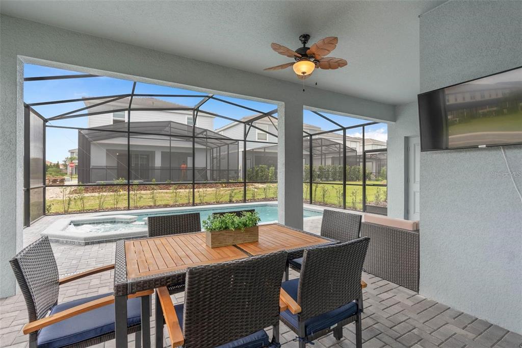 7180 Oakmoss Loop Davenport, FL 33837 - Photo 6 of 29 a view of a dining room with furniture window and outside view