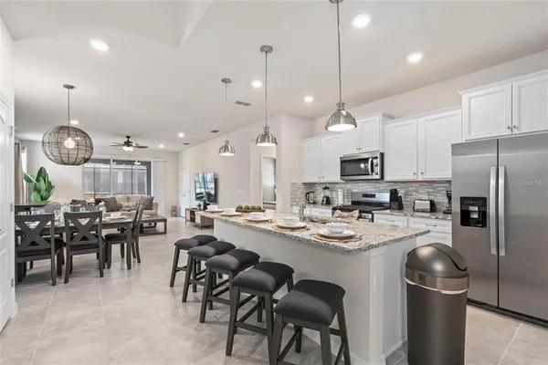 a kitchen with a stove and a sink