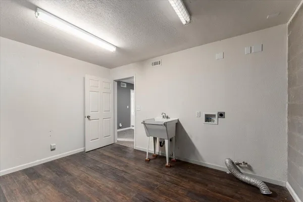 a balcony with wooden floor and outdoor space