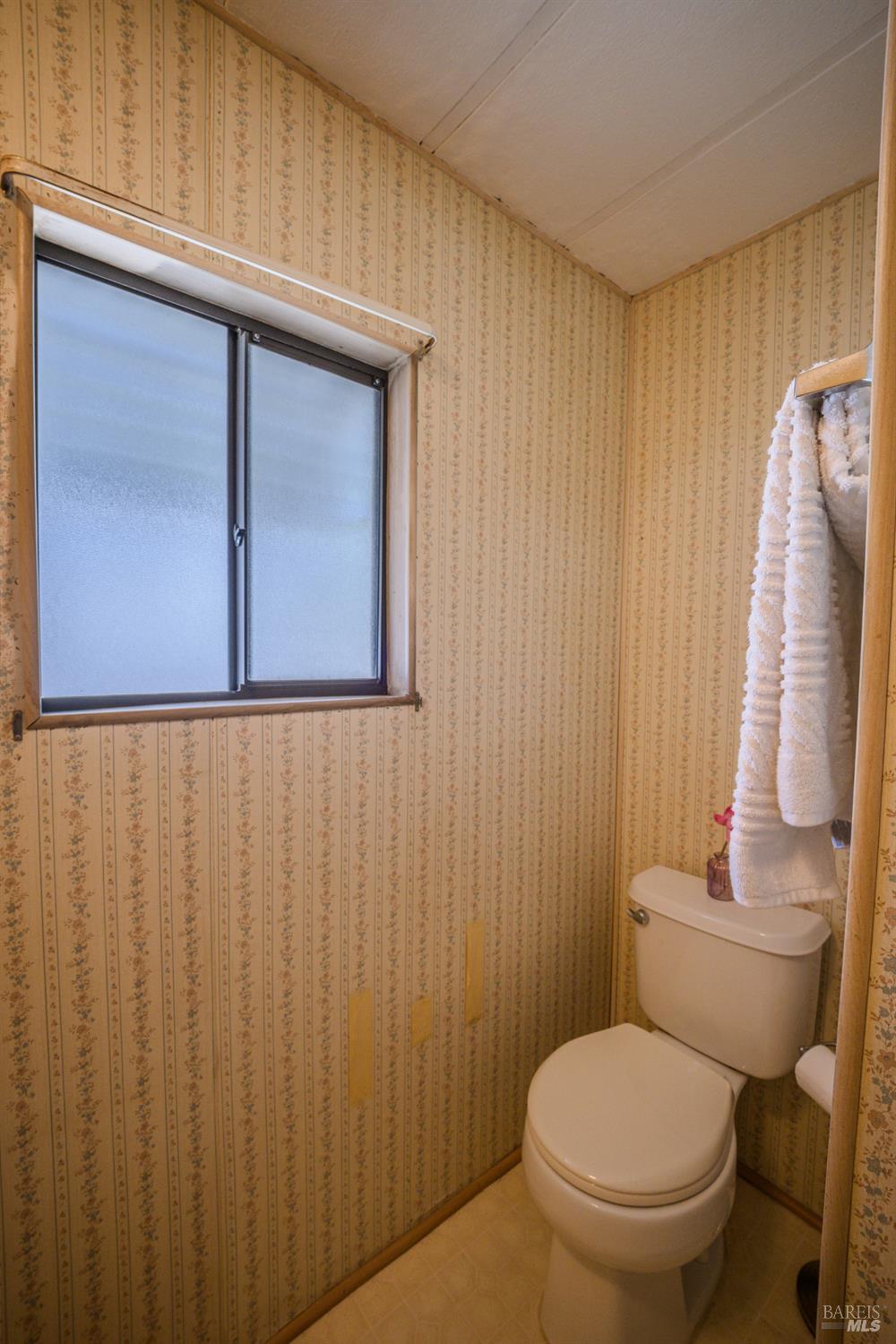 14 Balboa Court Fairfield, CA 94533 - Photo 17 of 27 a bathroom with a toilet and a sink