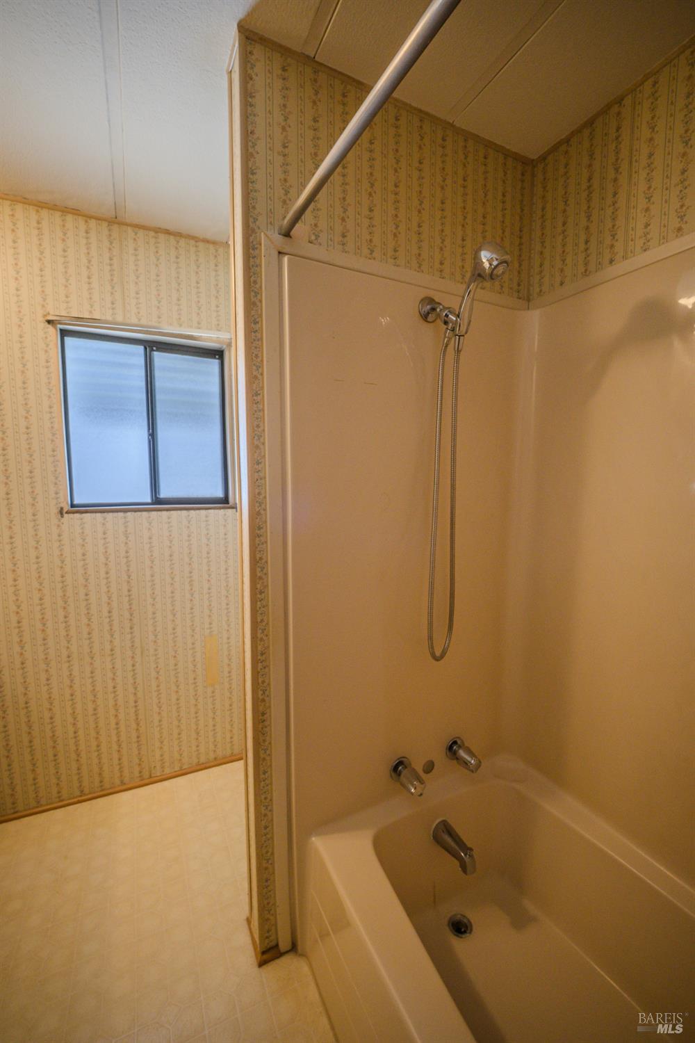 14 Balboa Court Fairfield, CA 94533 - Photo 19 of 27 a bathroom with a tub and shower