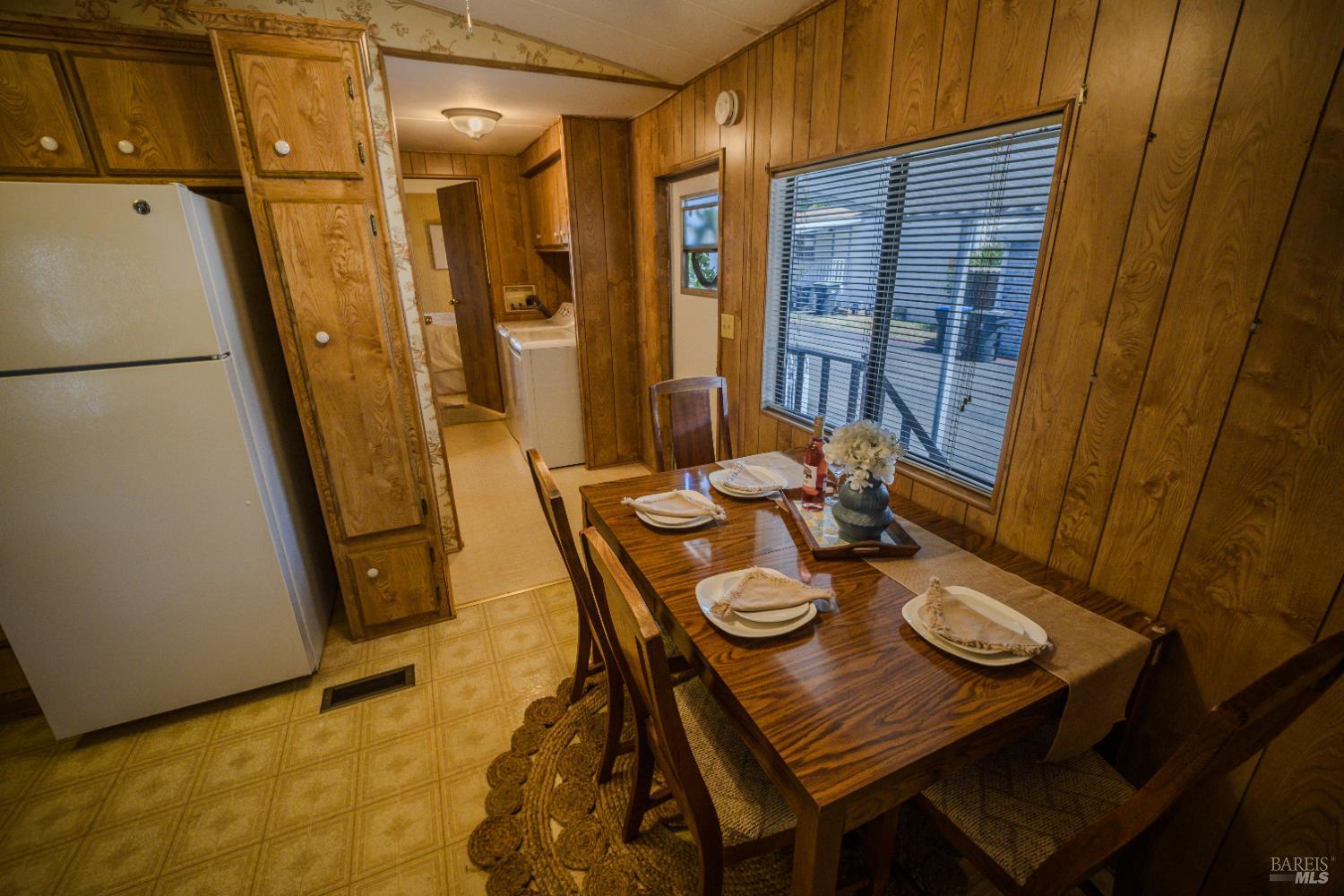 14 Balboa Court Fairfield, CA 94533 - Photo 7 of 27 a view of a dining room with furniture and wooden floor