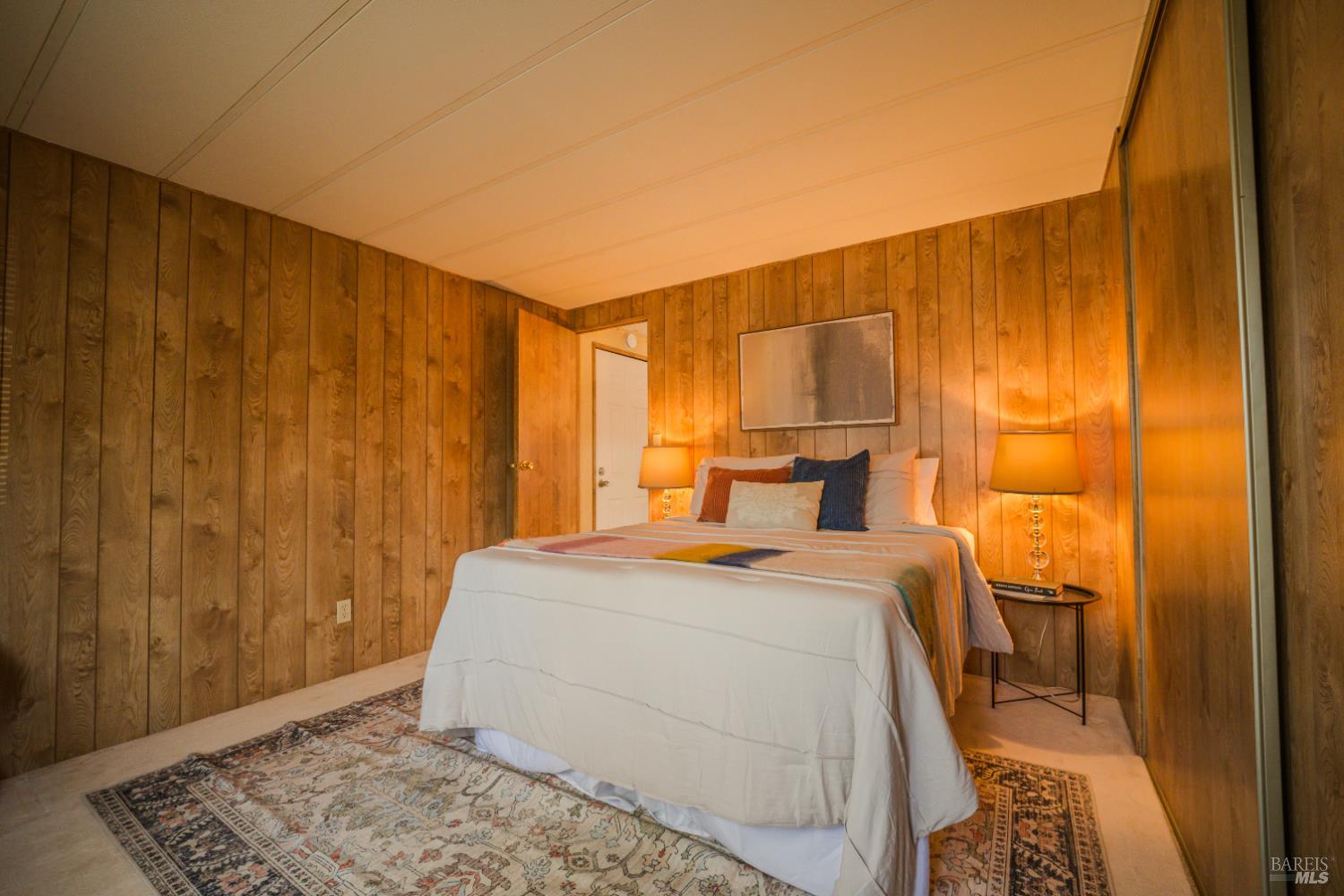 14 Balboa Court Fairfield, CA 94533 - Photo 9 of 27 a bedroom with a bed and wooden floor