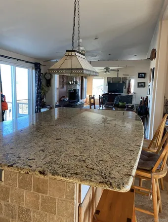 a view of a livingroom with furniture and window