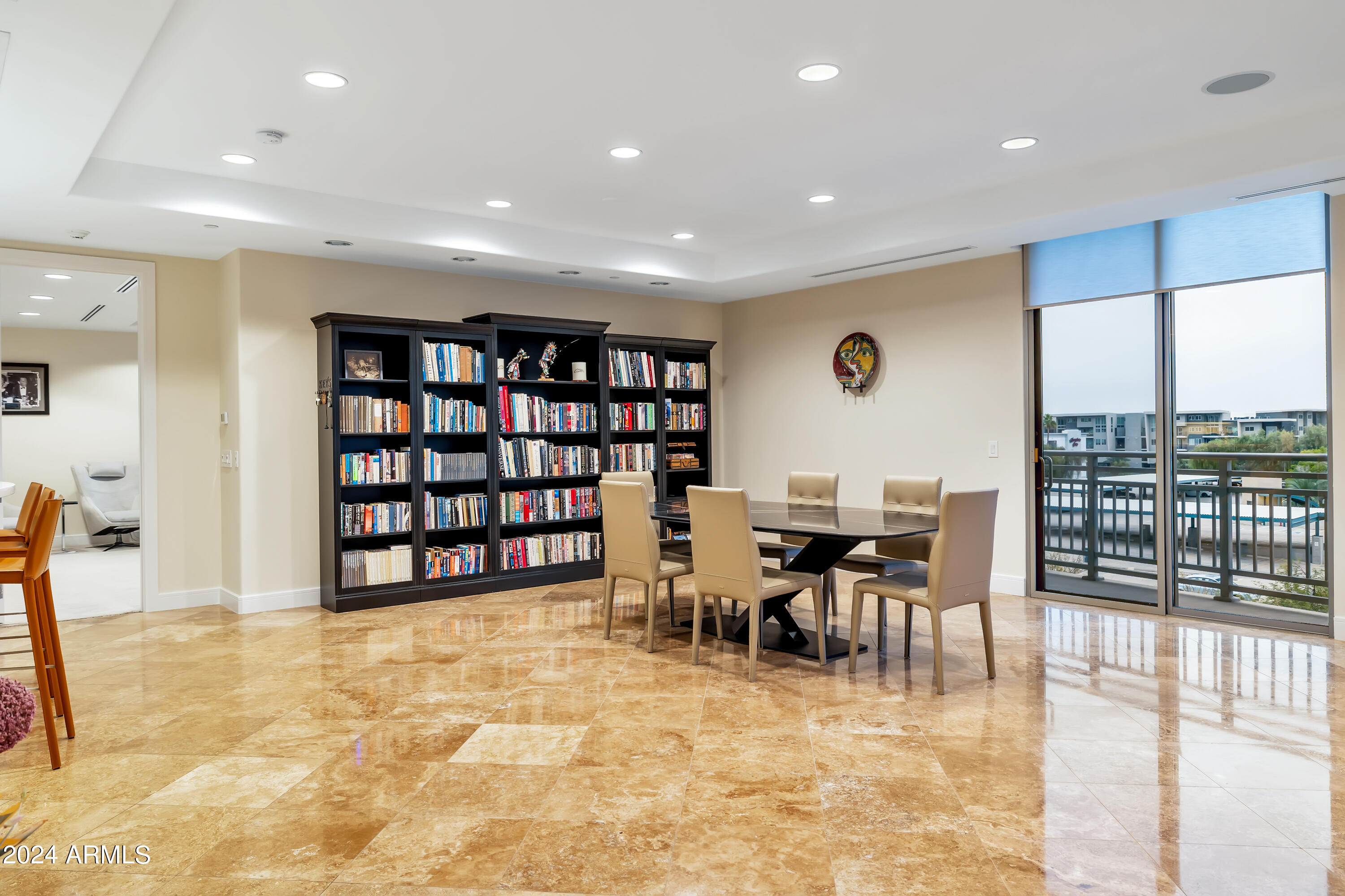 2211 East Camelback Road, Unit 407 Phoenix, AZ 85016 - Photo 2 of 36 a view of a dining room with furniture