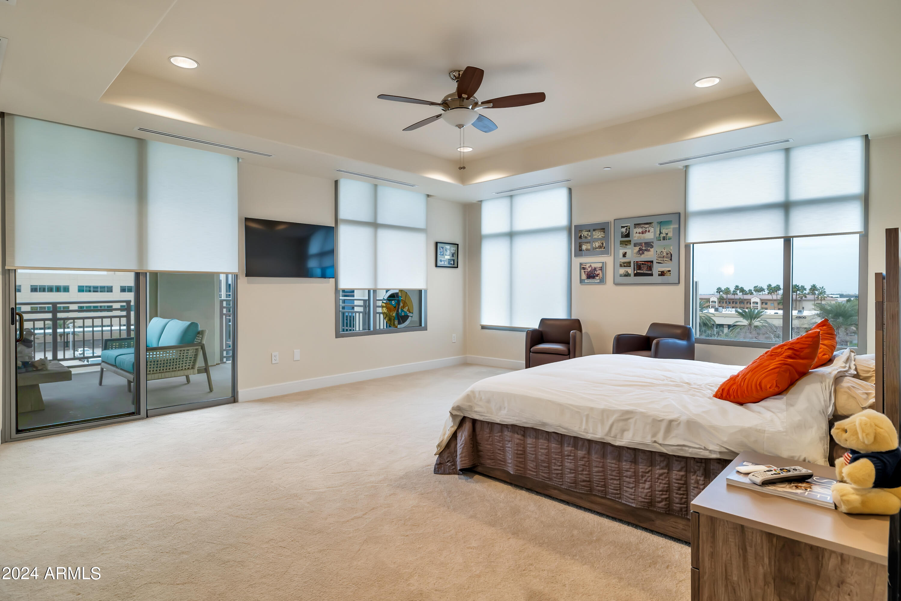 2211 East Camelback Road, Unit 407 Phoenix, AZ 85016 - Photo 26 of 36 a bedroom with a bed and window