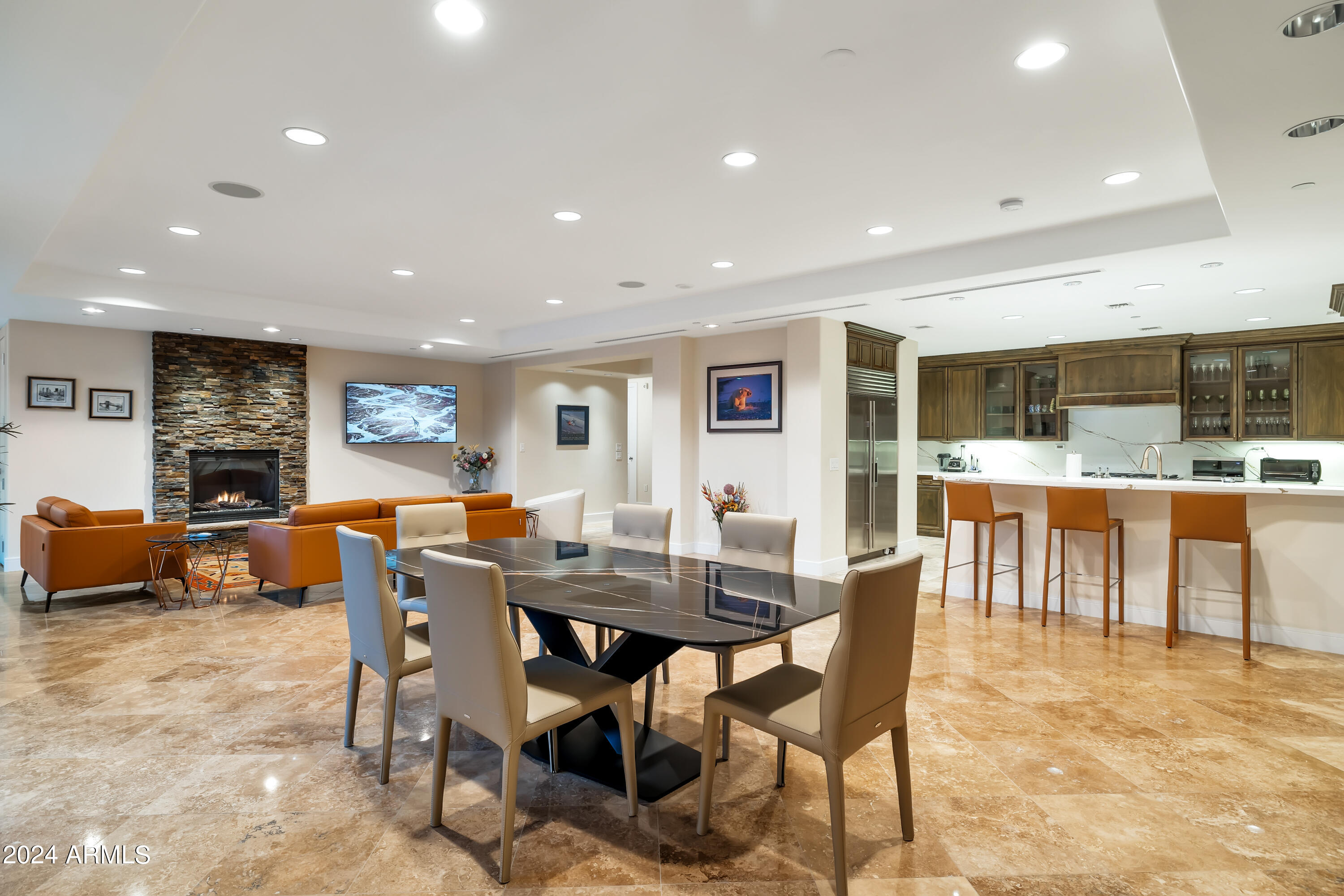 2211 East Camelback Road, Unit 407 Phoenix, AZ 85016 - Photo 3 of 36 a view of a dining area with furniture