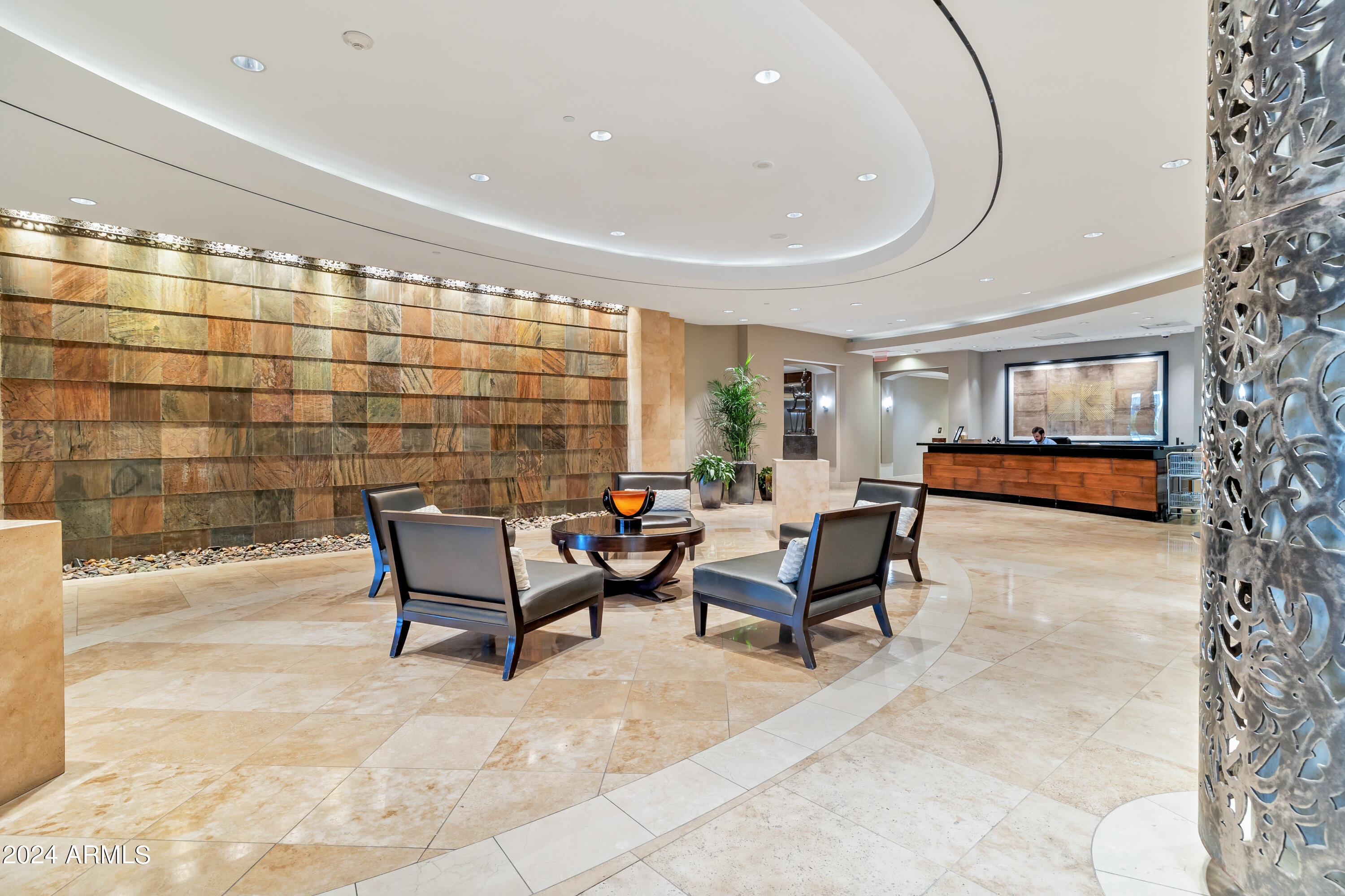 2211 East Camelback Road, Unit 407 Phoenix, AZ 85016 - Photo 9 of 36 a outdoor space with a couch