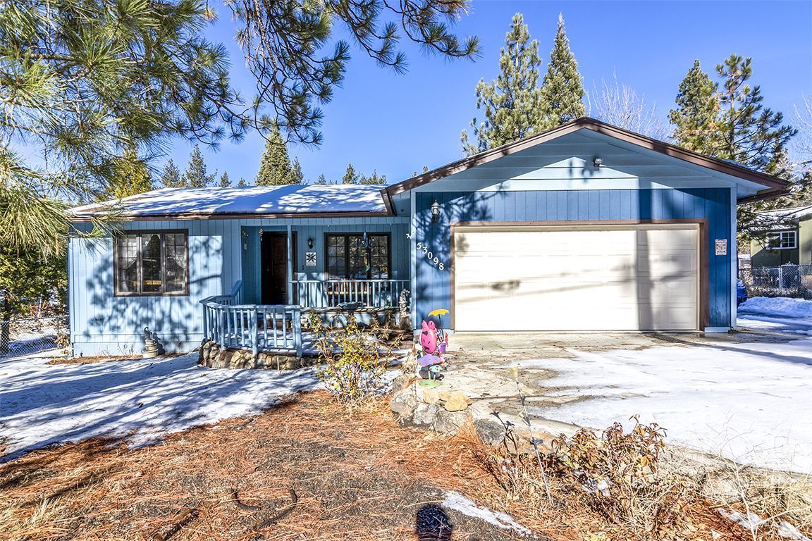 53098 Tollgate Road Idyllwild, CA 92549 - Photo 1 of 54 a front view of a house with basket ball court and outdoor seating