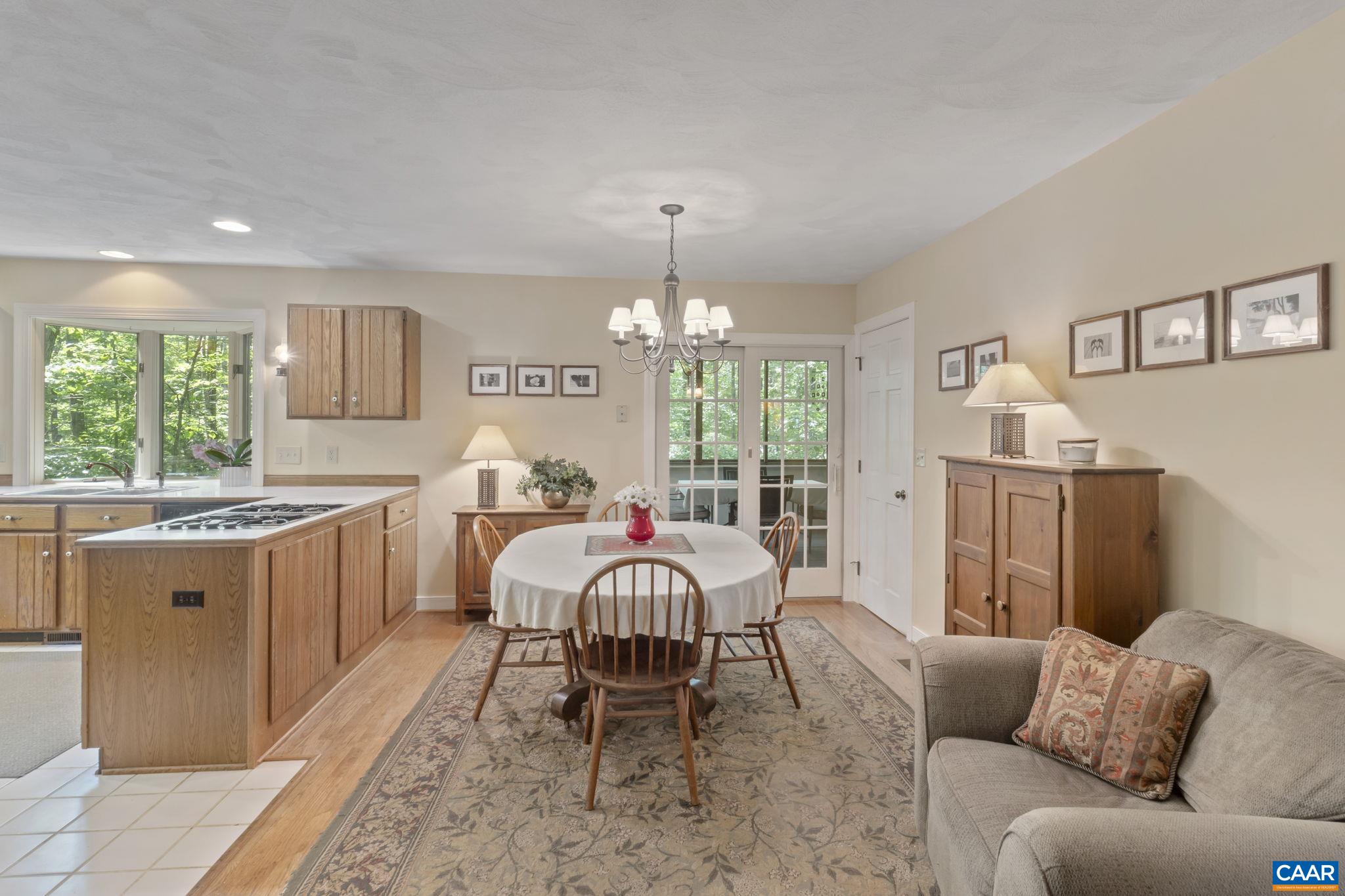 2 Whippoorwill Lane Palmyra, VA 22963 - Photo 7 of 36 a living room with furniture and a chandelier