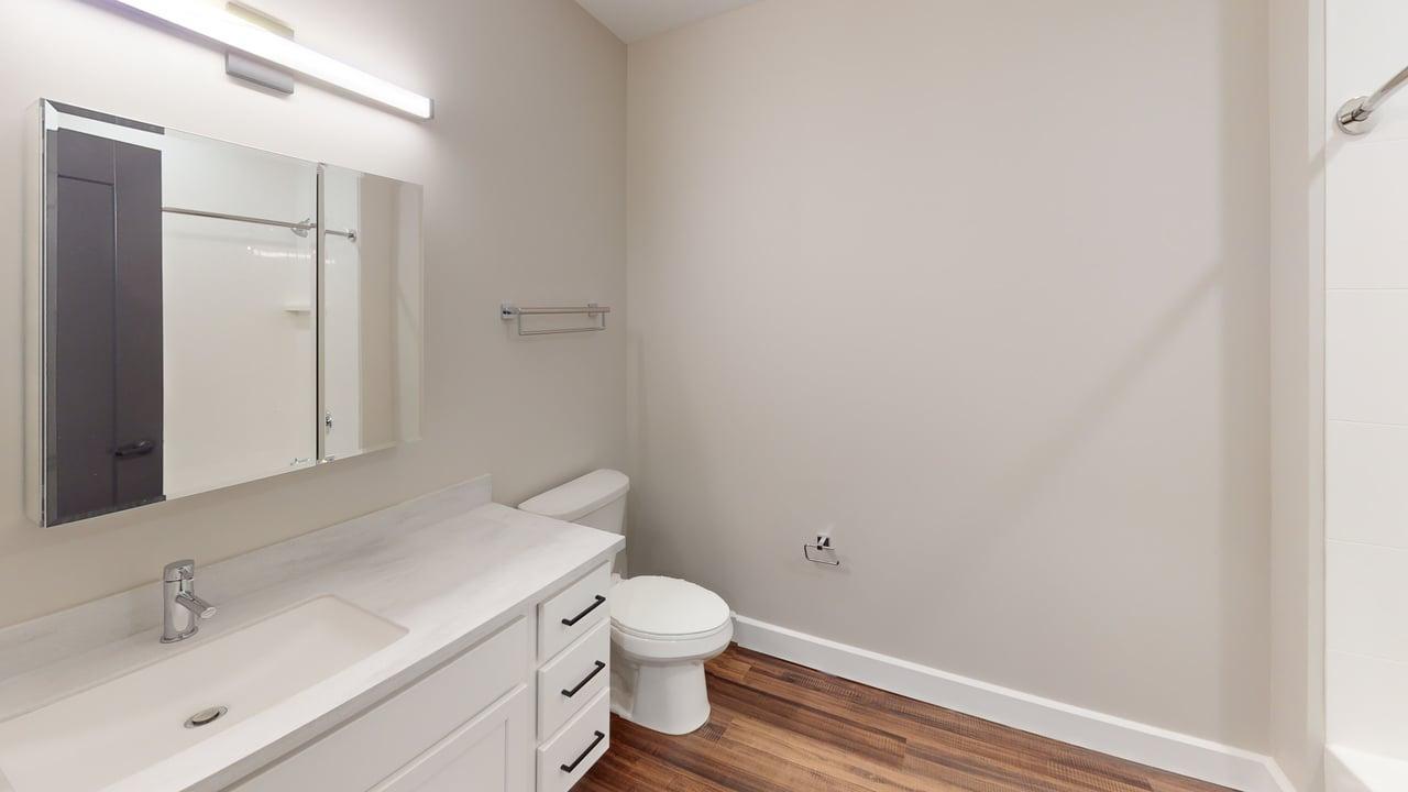 40 Dupage Court, Unit 409 Elgin, IL 60120 - Photo 12 of 22 a bathroom with a sink and a toilet