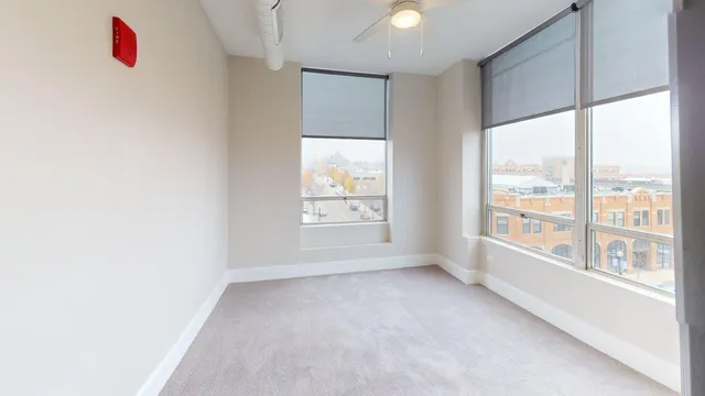 an empty room with windows