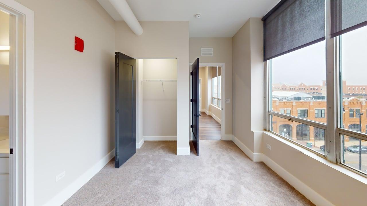 40 Dupage Court, Unit 409 Elgin, IL 60120 - Photo 15 of 22 an empty room with windows