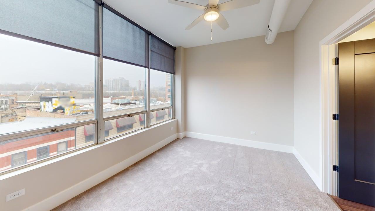 40 Dupage Court, Unit 409 Elgin, IL 60120 - Photo 16 of 22 an empty room with large windows
