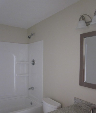 43 Merrymount Road, Unit 7 Quincy, MA 02169 - Photo 16 of 21 a bathroom with a bathtub and shower