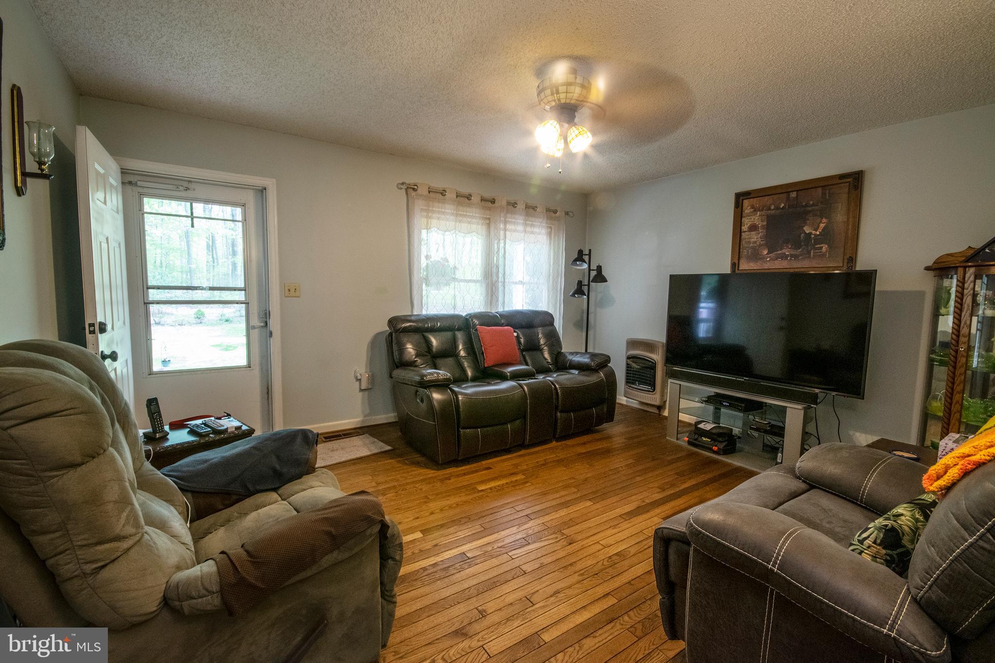 8601 Hancock Road Spotsylvania, VA 22553 - Photo 10 of 33 Living room with hardwood floors