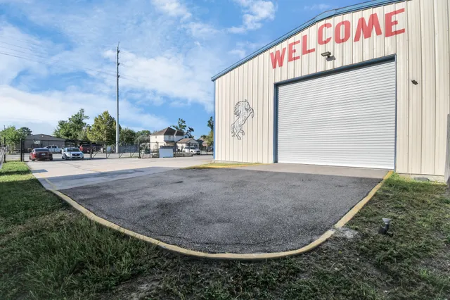 a view of a house with a street