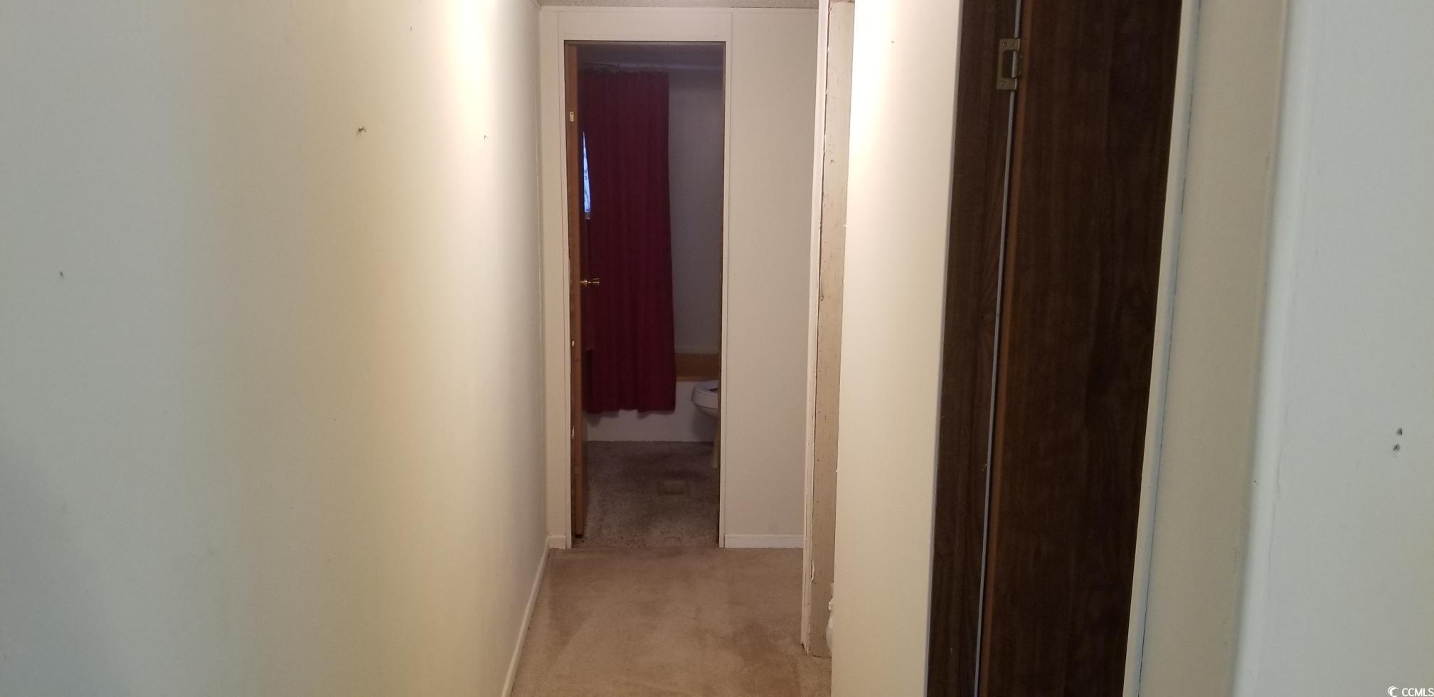 1046 Allen Street Conway, SC 29526 - Photo 14 of 25 Corridor featuring light colored carpet