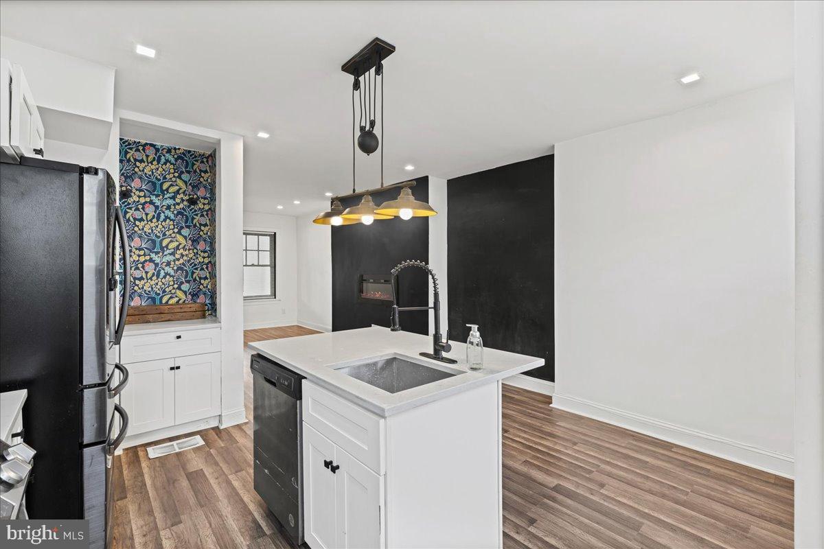 2637 Carroll Street Philadelphia, PA 19142 - Photo 11 of 31 a view of kitchen with refrigerator and window
