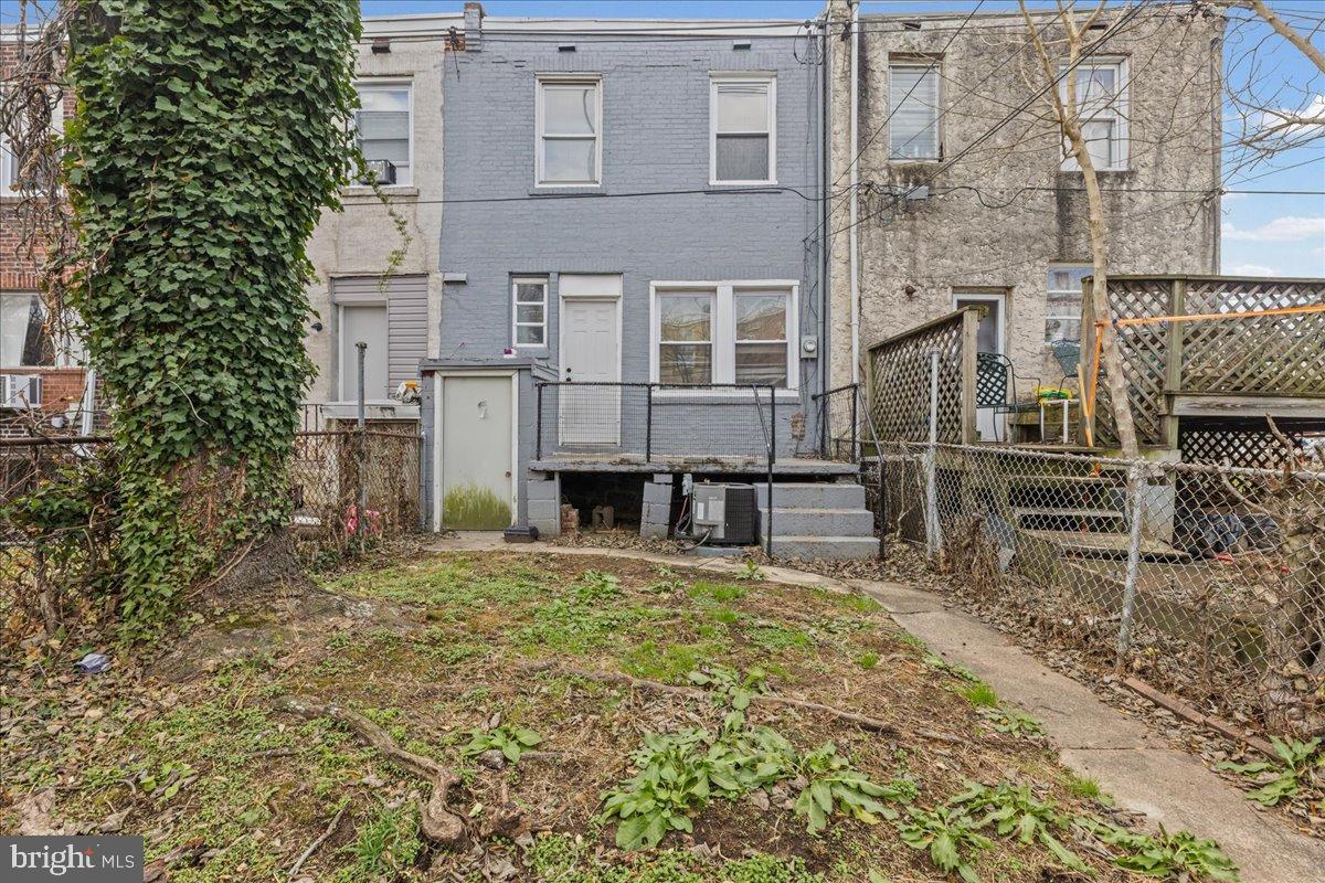 2637 Carroll Street Philadelphia, PA 19142 - Photo 27 of 31 front view of a house with a yard