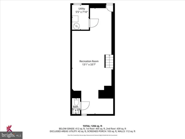 a picture of a bench in front of a wall