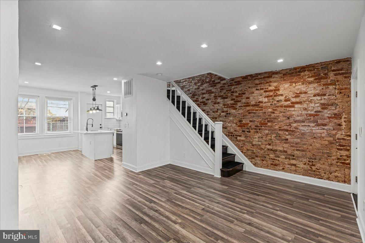 2637 Carroll Street Philadelphia, PA 19142 - Photo 6 of 31 a view of entryway and hall with wooden floor
