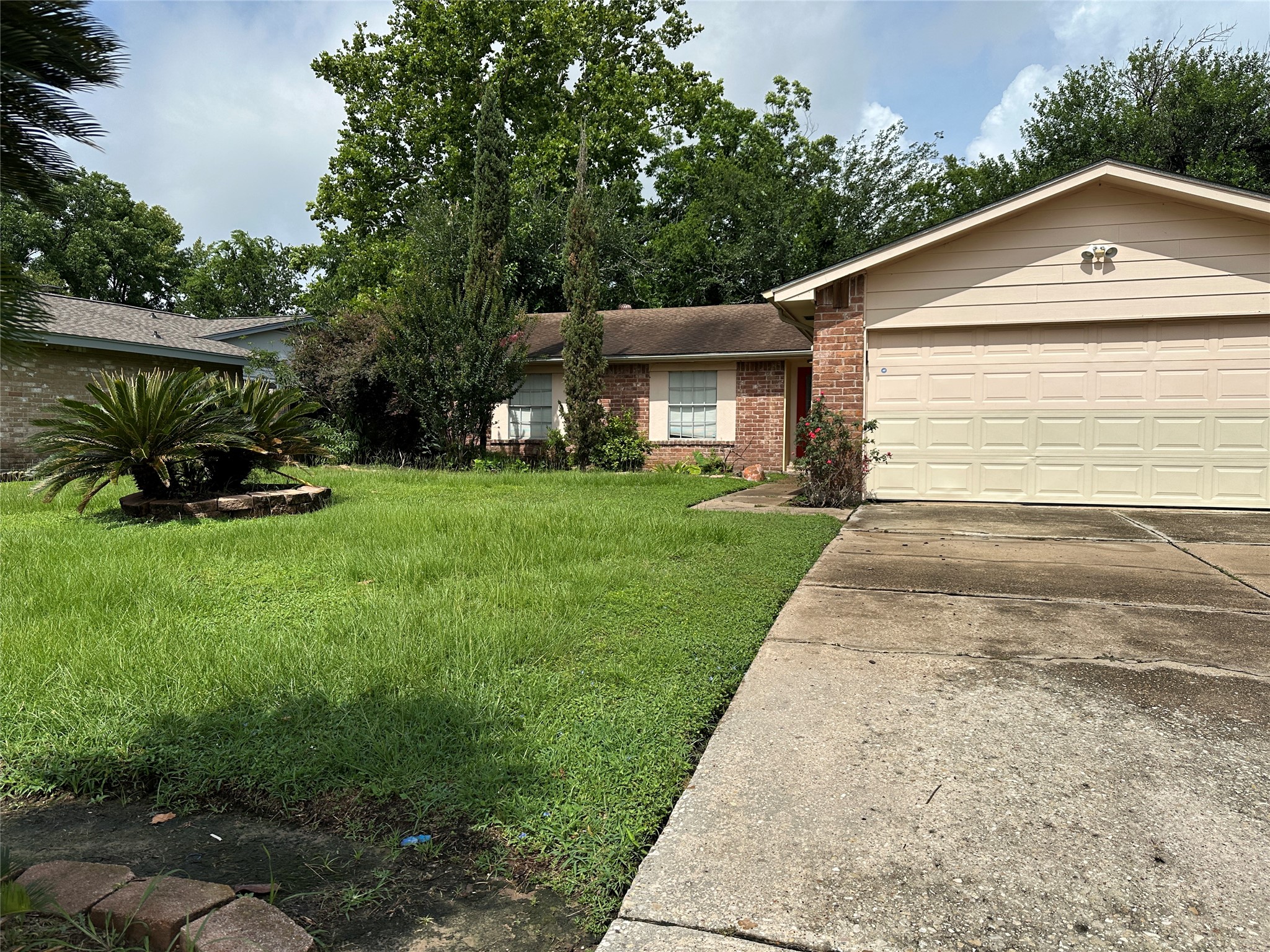 8511 Little River Road Houston, TX 77064 - Photo 1 of 19 a view of a front of a house with a yard