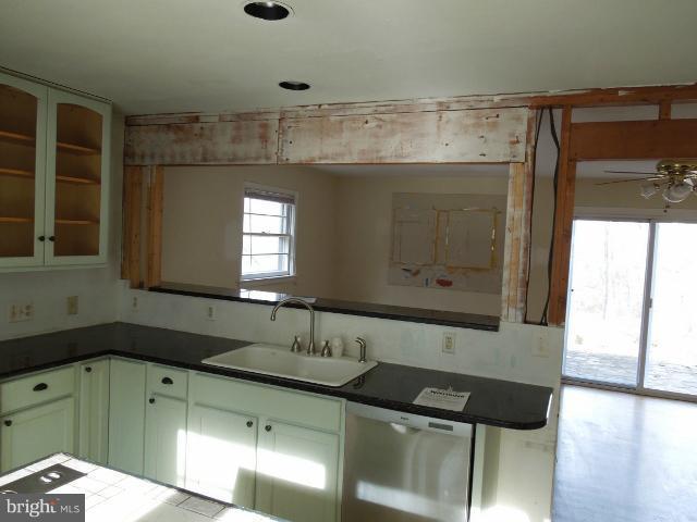 953 Pine Grove Road Bluemont, VA 20135 - Photo 11 of 25 a bathroom with a sink and a mirror