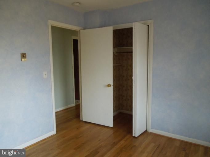 953 Pine Grove Road Bluemont, VA 20135 - Photo 17 of 25 a view of an empty room with wooden floor