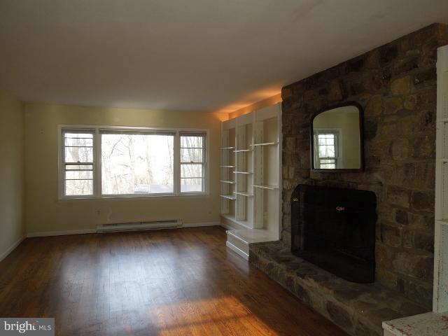 953 Pine Grove Road Bluemont, VA 20135 - Photo 20 of 25 wooden floor in an empty room with a window